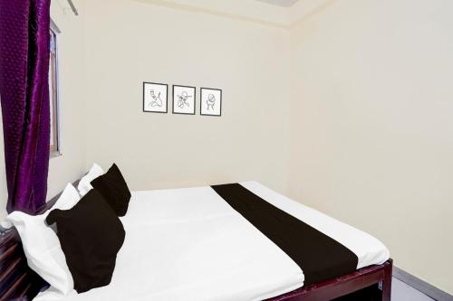 Postel nebo postele na pokoji v ubytování Hotel O Royal Grand Hotel