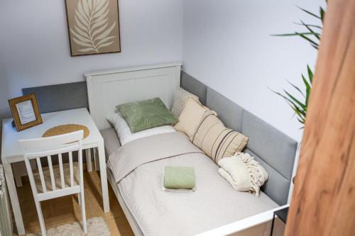 Postel nebo postele na pokoji v ubytování Apartament Boho Stare Miasto