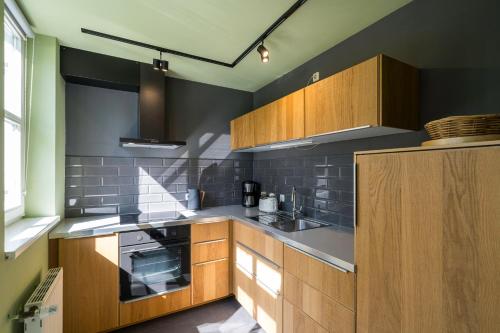 Η κουζίνα ή μικρή κουζίνα στο Haus am Schilf - Wohnung 5