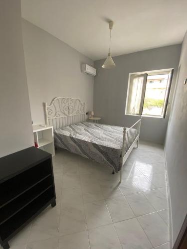 Postel nebo postele na pokoji v ubytování MAGA House