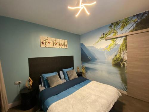 Ένα ή περισσότερα κρεβάτια σε δωμάτιο στο logement cosy spa