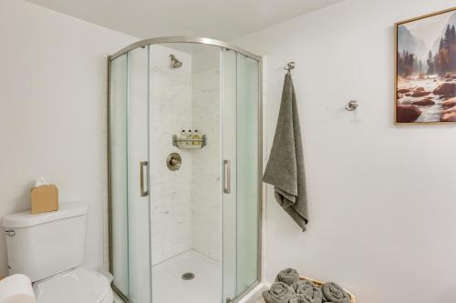a bathroom with a shower and a toilet at Steps to Susquehanna River Hot Tub Hideaway! in Dauphin