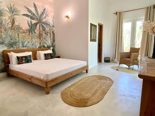 a bedroom with a large bed in a room at Luxury Lions Villas Zanzibar - with Private Cook&Infinity Pools in Kiwengwa