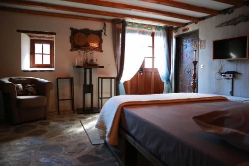 Photo de la galerie de l'établissement Chambre Steampunk Jules Vernes, à Bosbonparent