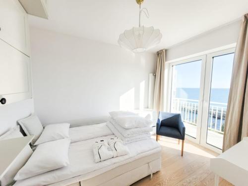 Postel nebo postele na pokoji v ubytování Apartament 108 Vista Mar Widok na Morze, Darłówko