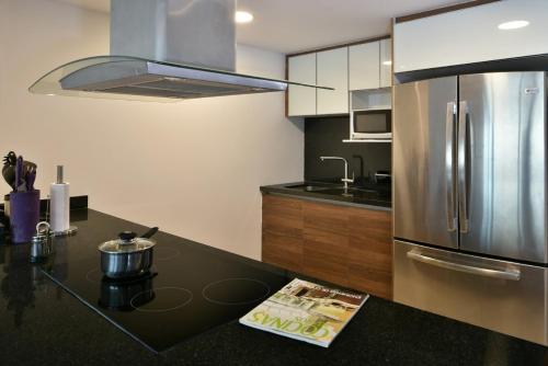 Dapur atau dapur kecil di Edificio Poseidon Depto. Vista Lateral al Mar