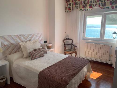 Posteľ alebo postele v izbe v ubytovaní Casa Castillo Finisterre