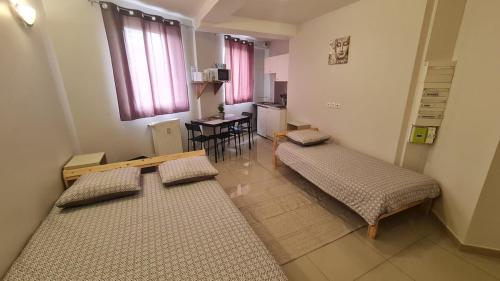 Ένα ή περισσότερα κρεβάτια σε δωμάτιο στο Un doux refuge