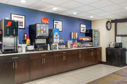 a coffee shop with a counter and aperature at Best Western Plus Berkshire Hills Inn & Suites in Pittsfield
