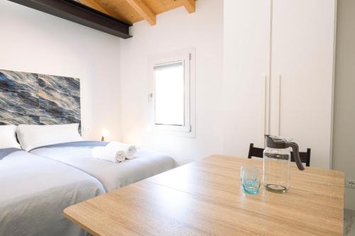 Un ou plusieurs lits dans un hébergement de l'établissement Celeste Charme Rooms