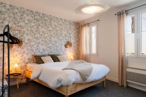 Postel nebo postele na pokoji v ubytování Charmante Maison à Rouen