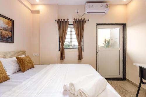 Cama o camas de una habitación en Move-Inn OBS Serviced Apartments Koramangala