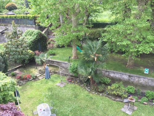 an aerial view of a garden with trees and plants at Hotel Trieste in Morbegno