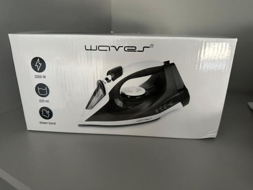 a ukwave telephone in a box on a counter at Moderne FerienWohnung NeuBau Merzig in Merzig