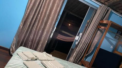 Un ou plusieurs lits dans un hébergement de l'établissement Hospedaria Coisa Linda Caraiva