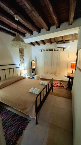 a bedroom with a large bed in a room at Simona Stone House in Polis Chrysochous