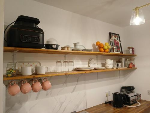 Η κουζίνα ή μικρή κουζίνα στο Westport Riverlane Appt