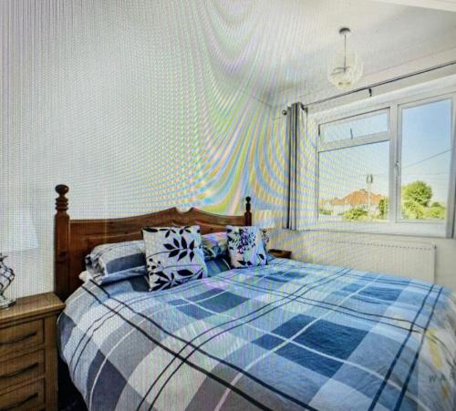 Katil atau katil-katil dalam bilik di Ocean View in Worthing, sleeps 9