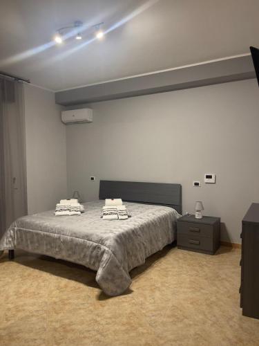 Postel nebo postele na pokoji v ubytování Dimora Sole & Sogni