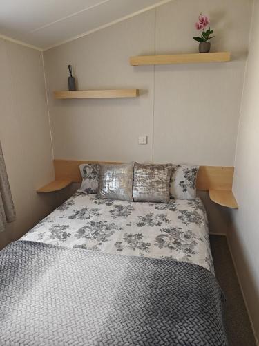 Ένα ή περισσότερα κρεβάτια σε δωμάτιο στο Family Holiday Home with private terrace