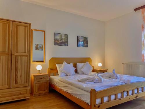 Posteľ alebo postele v izbe v ubytovaní Guszti Villa Hévíz