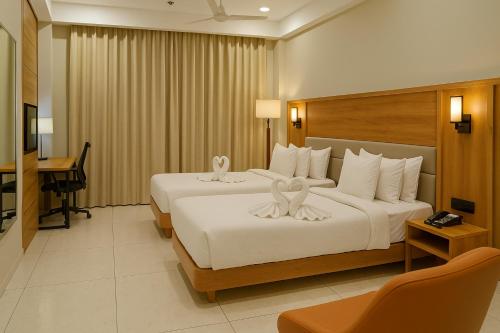 Katil atau katil-katil dalam bilik di The Sky Imperial Hotel Kailash