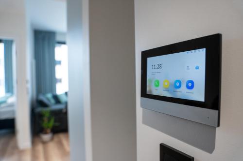 TV a/nebo společenská místnost v ubytování Towarowa Towers Residences