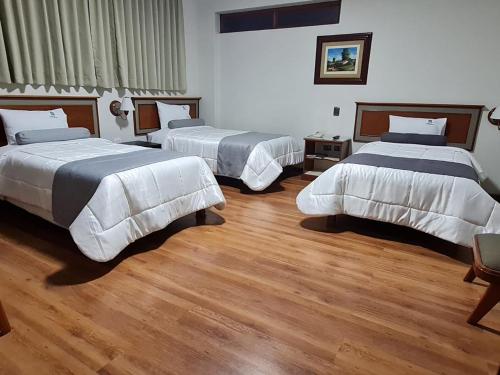 Voodi või voodid majutusasutuse Hotel Continental (Cajamarca) toas