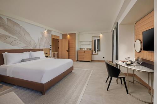Postel nebo postele na pokoji v ubytování Sirene Belek Hotel