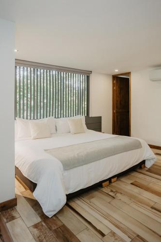 Katil atau katil-katil dalam bilik di Nomadic Suites