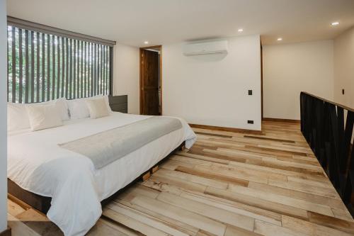 Katil atau katil-katil dalam bilik di Nomadic Suites