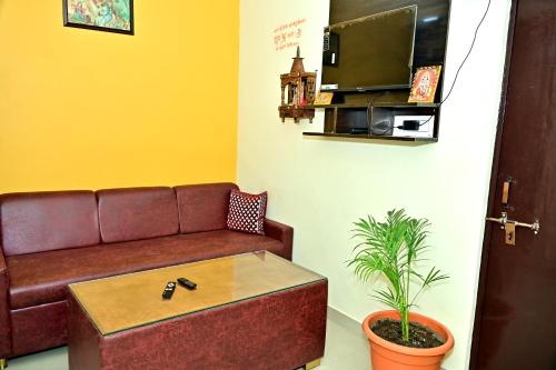 Kuchyň nebo kuchyňský kout v ubytování The Sunrise Ayodhya Guest House