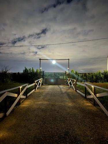 a bridge with a street light on it at Monte do Bidé Private Farm Peace and Nature in Setúbal
