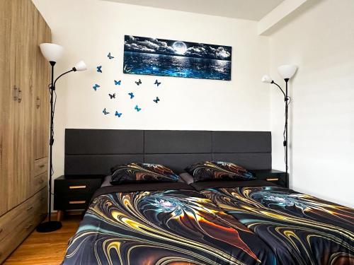 Postel nebo postele na pokoji v ubytování IN Apartments
