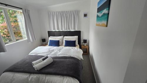 Ein Bett oder Betten in einem Zimmer der Unterkunft Orewa Kiwi Cabins