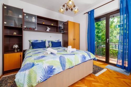 Postel nebo postele na pokoji v ubytování Apartment Katarina