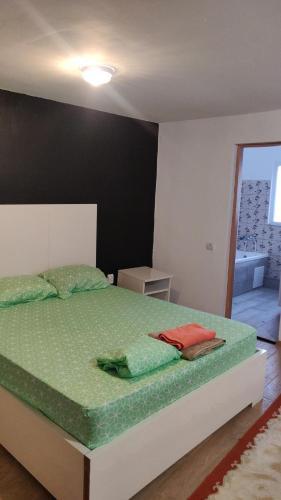 Кровать или кровати в номере Iris studio spacious apartment