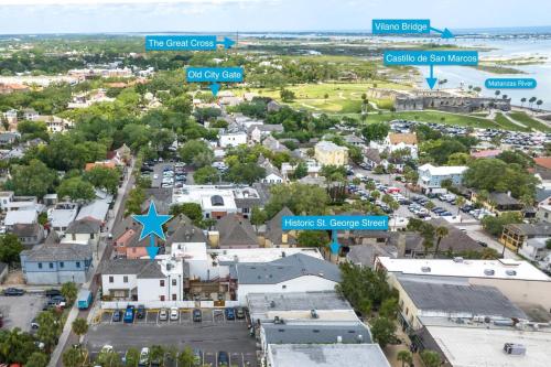 an aerial view of a city with houses and condos at 61 Spanish St. Unit A in St. Augustine
