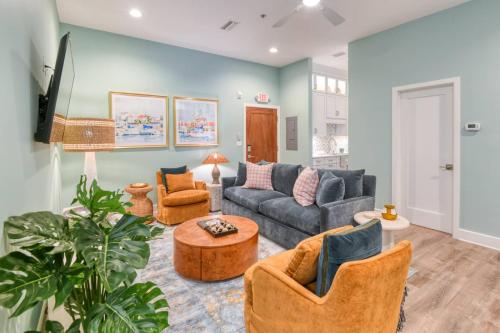a living room with a couch and chairs at 61 Spanish St. Unit B in St. Augustine
