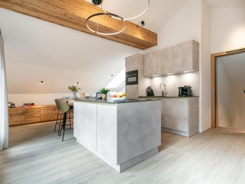 a kitchen with a counter top in a room at Alpenlodge Pettneu Lodge 1 in Pettneu am Arlberg