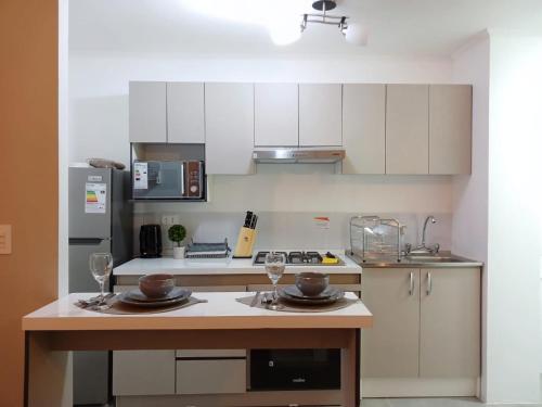 Kuchyň nebo kuchyňský kout v ubytování Agradable departamento familiar en Los Andes