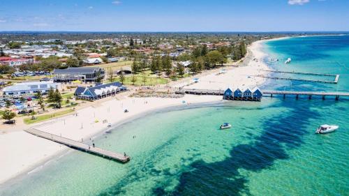 an aerial view of a beach with a pier at Barefoot Beach Cottage in Geographe