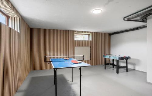 a room with two ping pong tables in it at 3 Bedroom Cozy Home In Sønder Felding in Sønder Felding