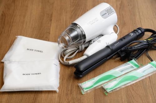a wii remote and other items on a table at Venture in Ōdōri