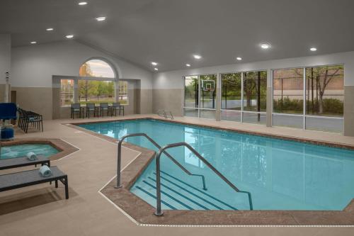 a large swimming pool in a hotel room at Residence Inn Salt Lake City Sandy in Sandy