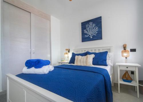 Ένα ή περισσότερα κρεβάτια σε δωμάτιο στο Dimary Condo in Dominicus La Romana Dom Rep