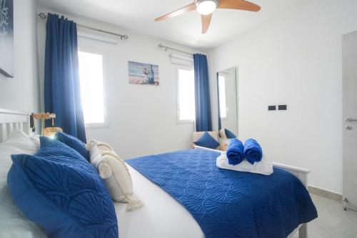 Ένα ή περισσότερα κρεβάτια σε δωμάτιο στο Dimary Condo in Dominicus La Romana Dom Rep