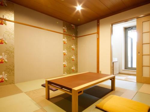 Stolní tenis v ubytování Arima Hot Spring Ryokan Kotori nebo okolí
