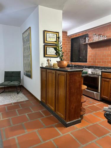 a kitchen with an island in the middle of a room at Comfort and a perfect location in Valencia