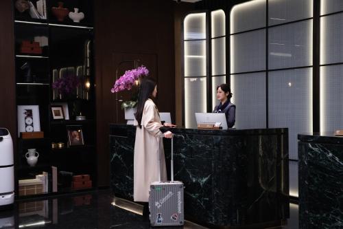 Huéspedes de 义乌君忆云澜国际酒店 Yiwu Junyi Yunlan International Hotel